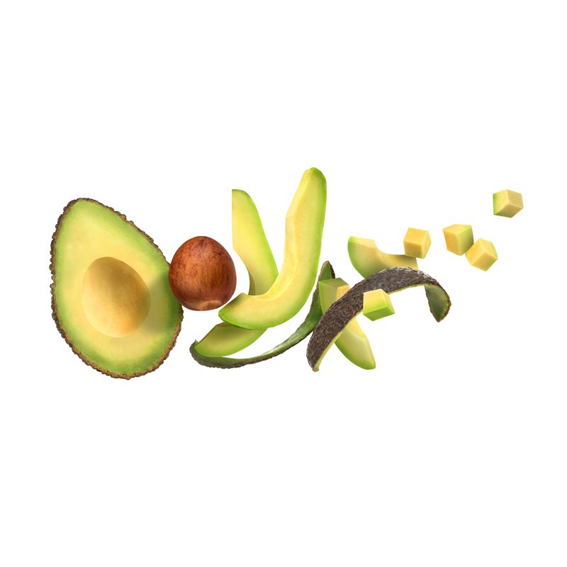 Life Extension, NMN rich avocado cut in half, with stone, peel and diced avocado thrown into air
